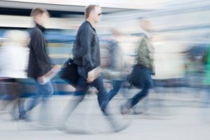 7967680-blurred-image-of-people-rushing-to-work-in-the-morning